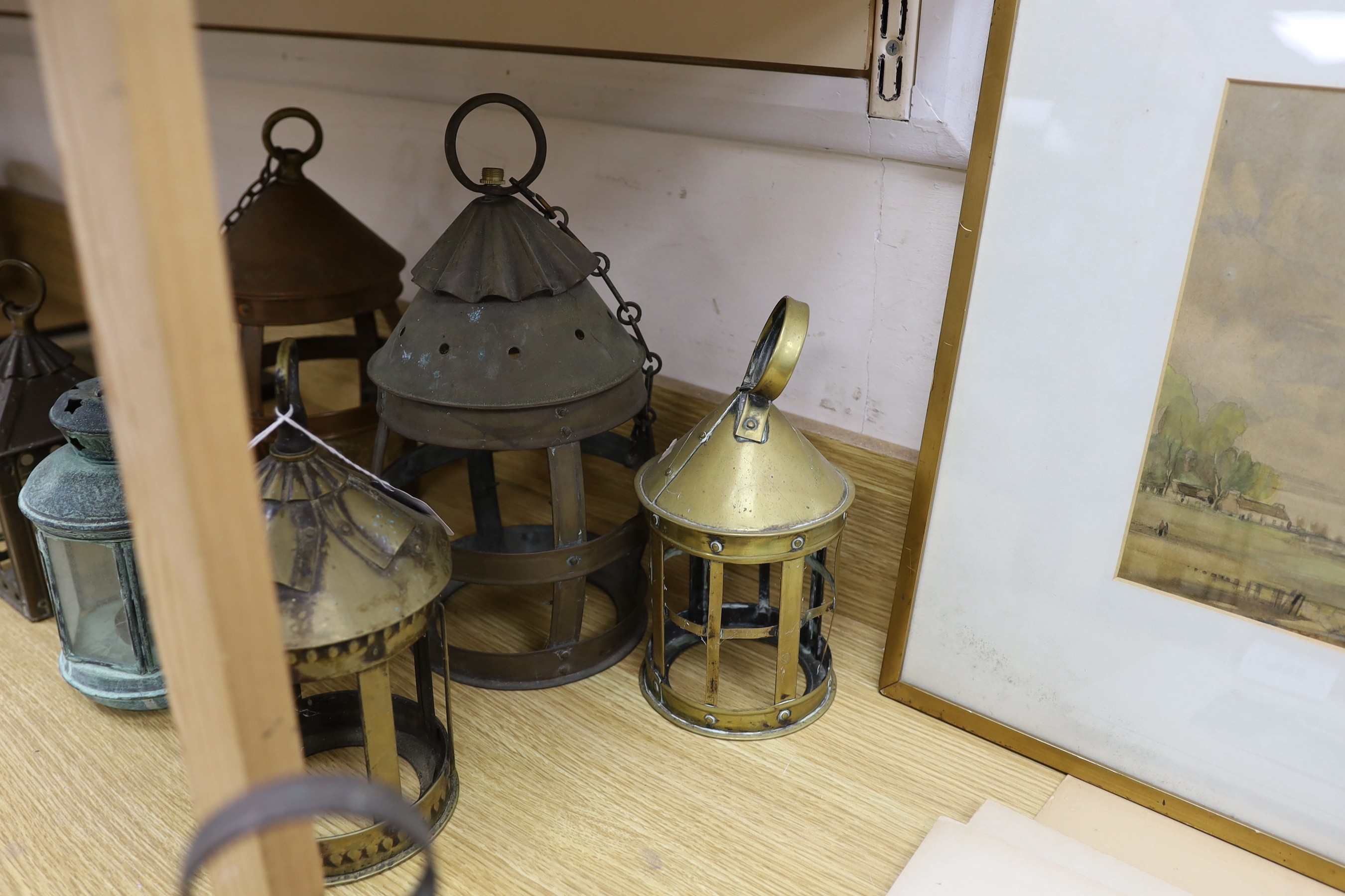 Seven brass and copper lanterns, tallest 35cms high
